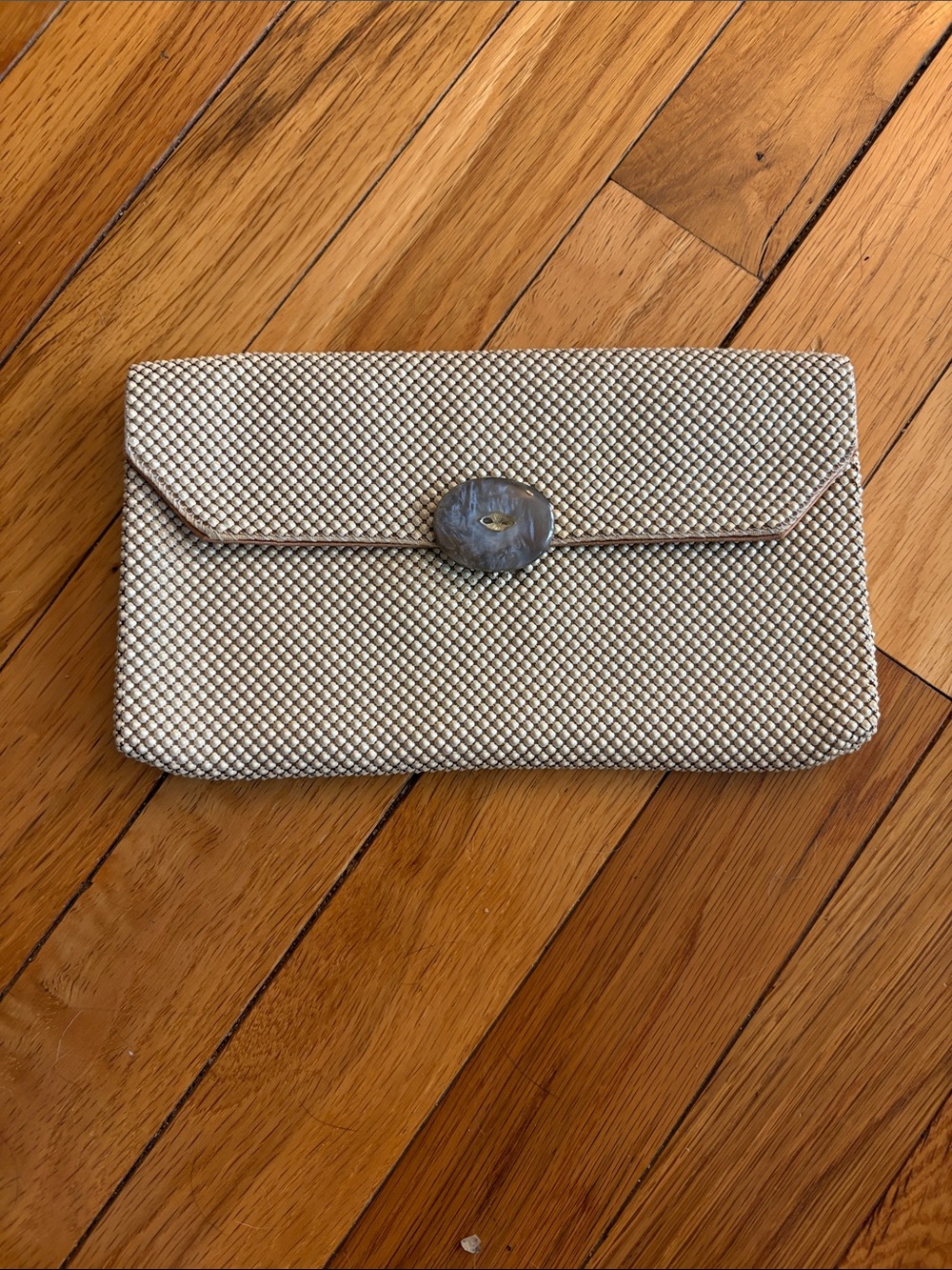 Whiting and Davis Mesh cream clutch with pearlescent button closure